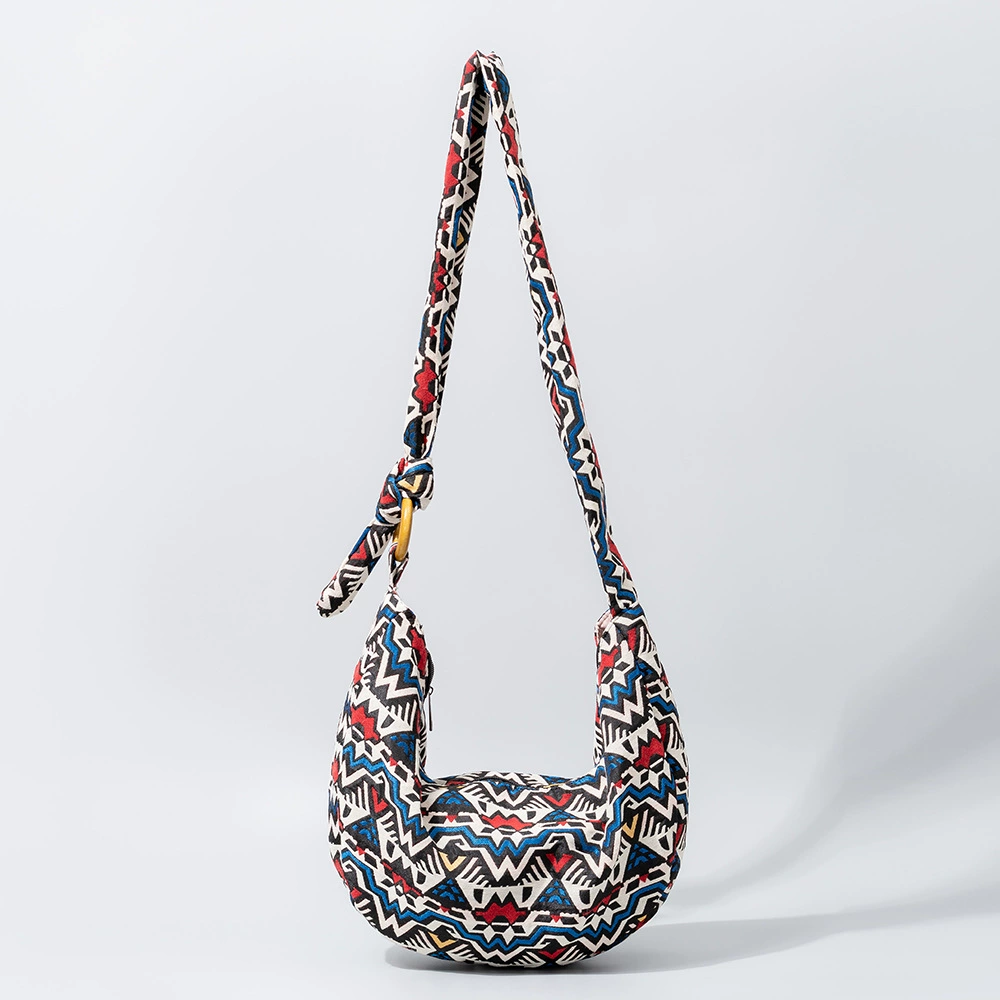 Handwoven Nomad Bag at beach sunset scene