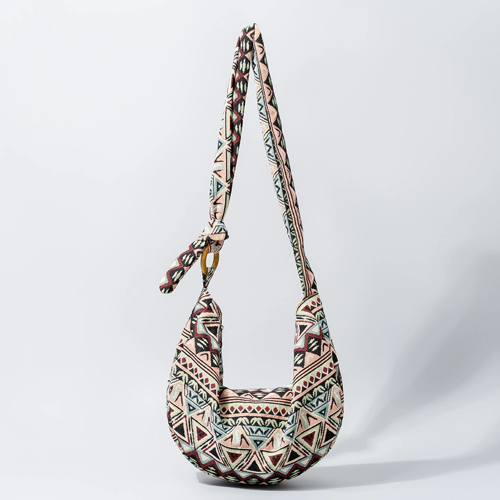 Handwoven Nomad Bag: Bohemian moon motifs design close-up