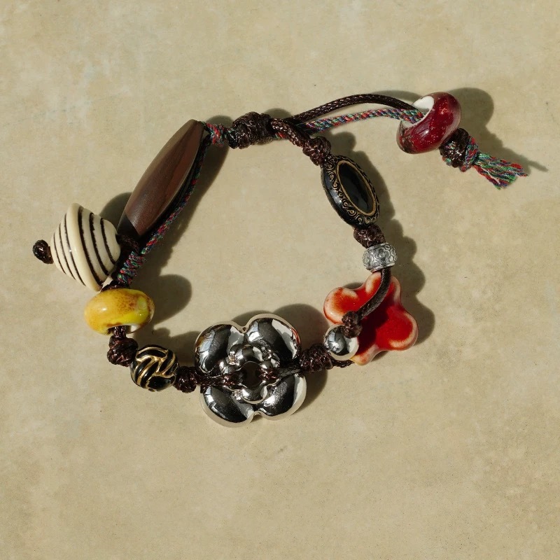 THE BEAST Tibetan Ceramic Wooden Bead Bracelet: Festival Scene